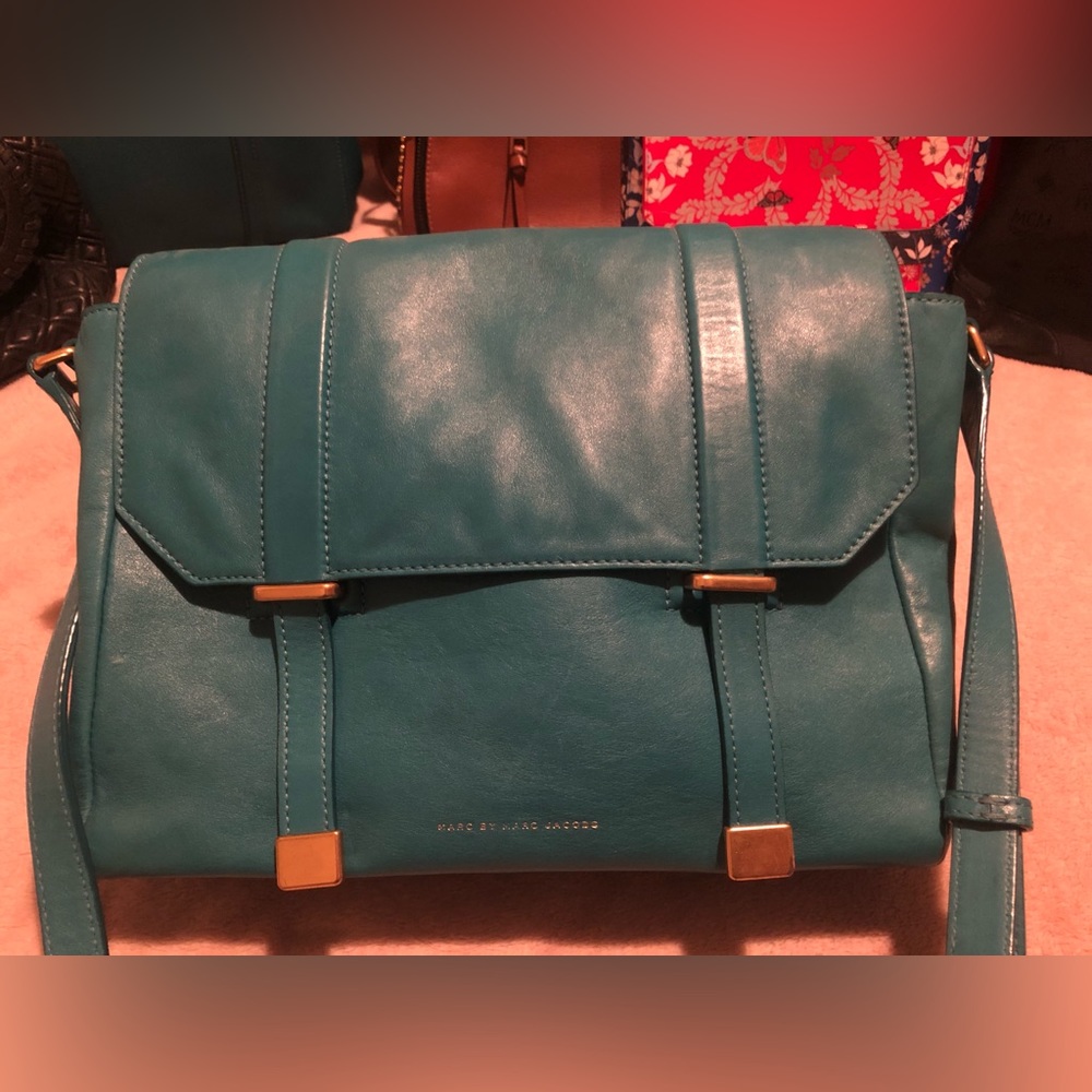 Marc by Marc Jacobs. A rare collection. It’s a teal colour with gold hardware